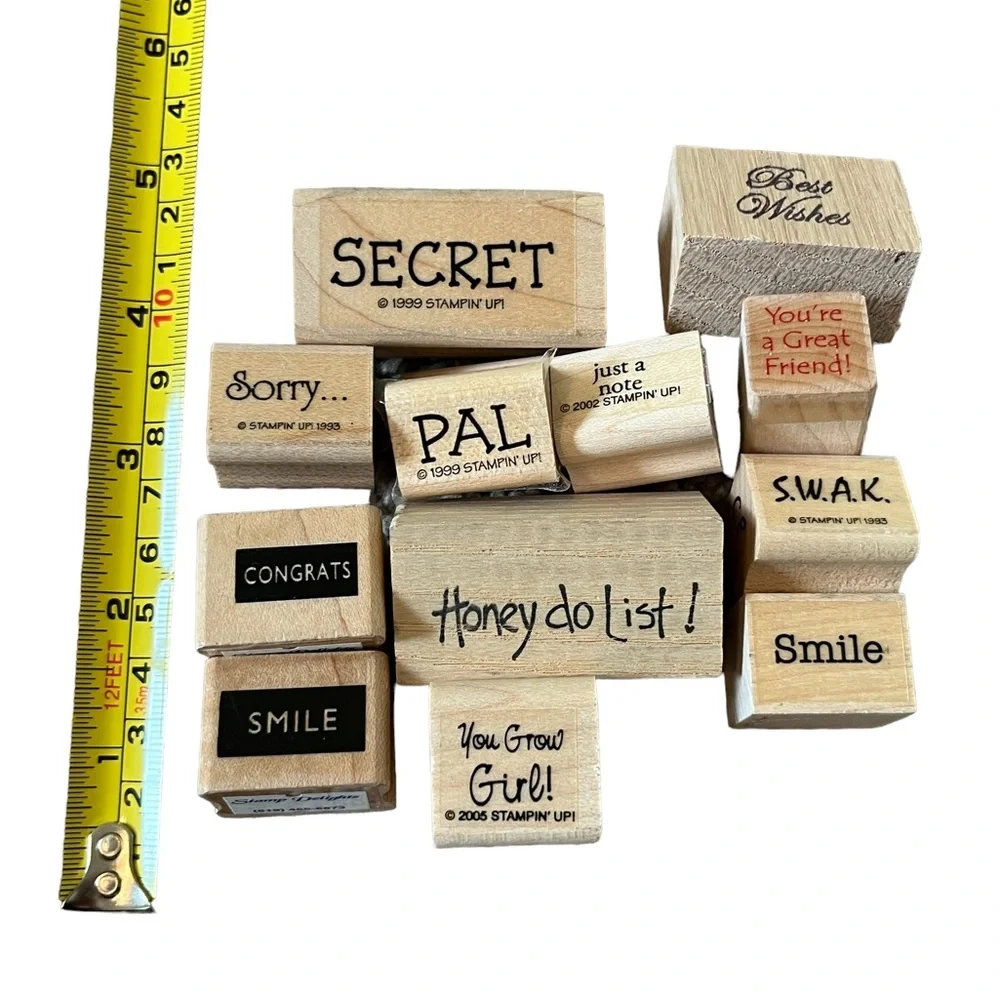 Lot of 12 mini word rubber stamps. Most of the stamps are brand new.